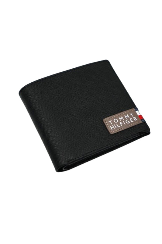 Tommy Hilfiger Wallet is a one to face solid style covered in light/black leather image 3