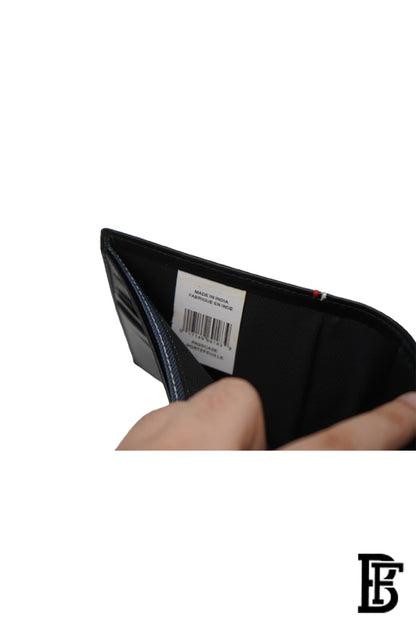 Tommy Hilfiger Wallet is a one to face solid style covered in light/black leather image 6