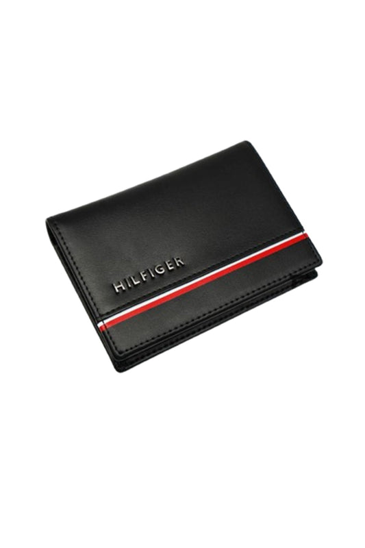Tommy Hilfiger wallet is a one to face solid style covered in light/black leather image 3