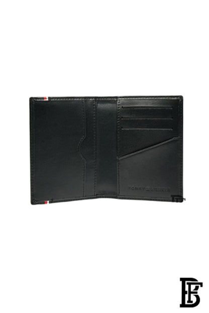 Tommy Hilfiger wallet is a one to face solid style covered in light/black leather image 4