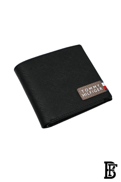 Tommy Hilfiger Wallet is a one to face solid style covered in light/black leather image 3