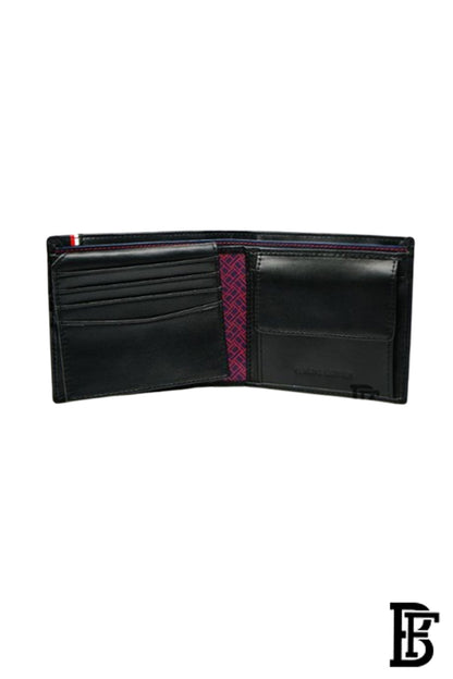 Tommy Hilfiger wallet is a one to face solid style covered in light/black leather image 3