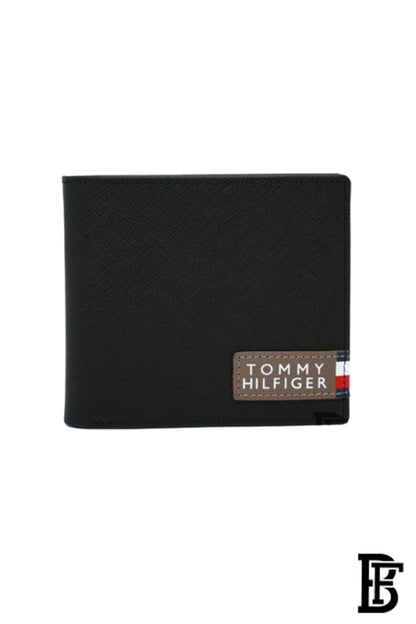 Tommy Hilfiger Wallet is a one to face solid style covered in light/black leather image 2
