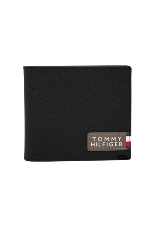 Tommy Hilfiger Wallet is a one to face solid style covered in light/black leather image 2