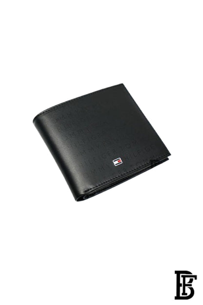 Tommy Hilfiger Wallet is a one to face solid style covered in light/black leather image 2