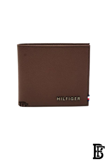 Tommy Hilfiger wallet is a one to face solid style covered in light/BROWN leather image 2